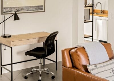 Suite 2's living area features a dedicated workspace